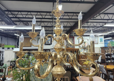 Ornate brass chandelier on display in store