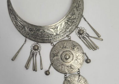ornate tribal silver necklace with medallions