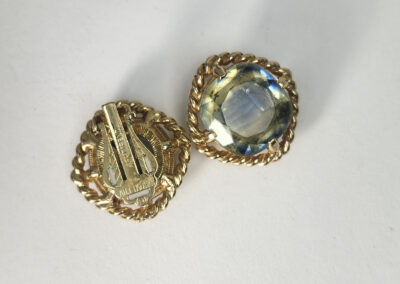 Vintage gold clip-on earrings with faceted glass