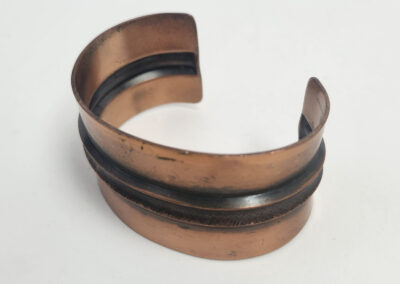 Antique copper cuff bracelet with dark stripe
