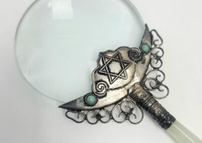 Ornate magnifying glass with Star of David