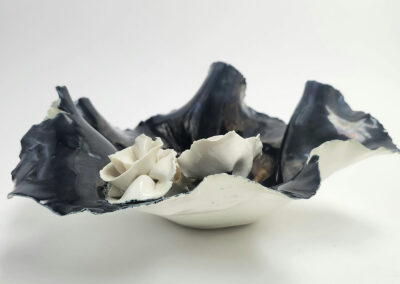 Black-and-white ceramic bowl with porcelain roses