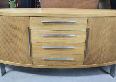 Mid-century rounded wooden credenza with drawers