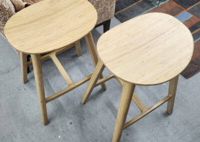 Pair of light wooden oval stools
