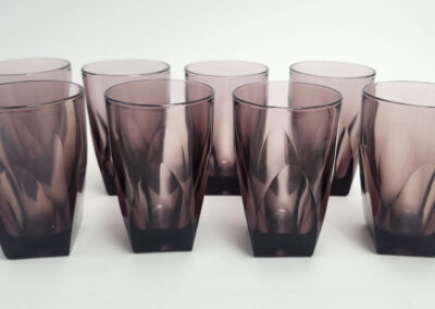Set of eight purple faceted drinking glasses