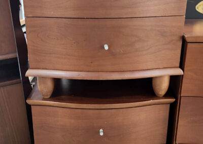 Brown wooden three-drawer dresser