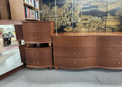 Curved wooden dresser set with mirror