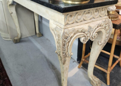 Antique carved console table with lion paw feet