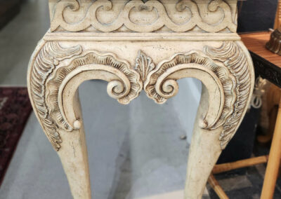 Antique carved pedestal table with claw feet
