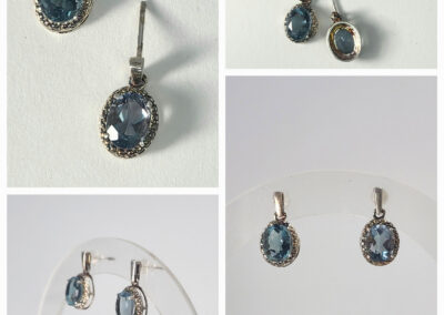 Blue oval gemstone silver dangle earrings