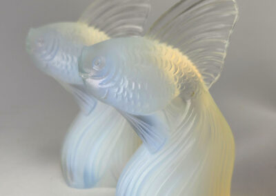 Pair of opalescent frosted glass fish sculptures