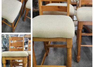 Wooden ladder-back chairs with beige upholstered seats