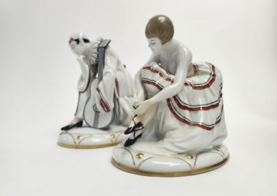 Porcelain ballerina and musician figurines