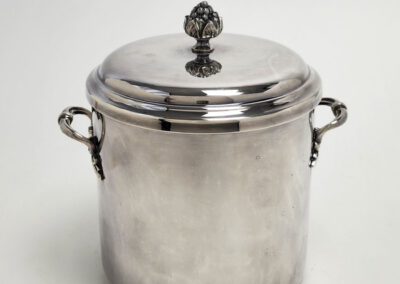 Polished silver lidded ice bucket with handles