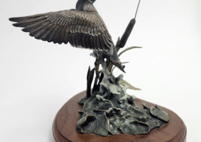 Mallard duck bronze sculpture on wooden base