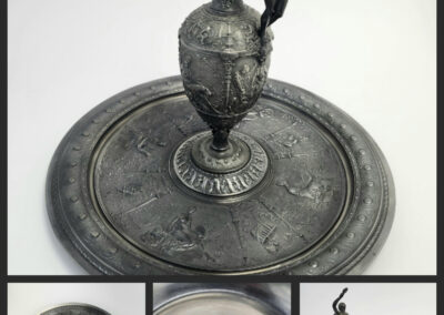 Antique ornate bronze ewer with round tray