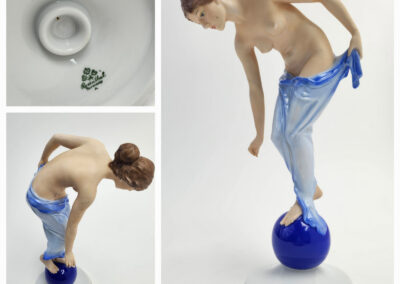 Porcelain figurine of woman balancing on blue globe