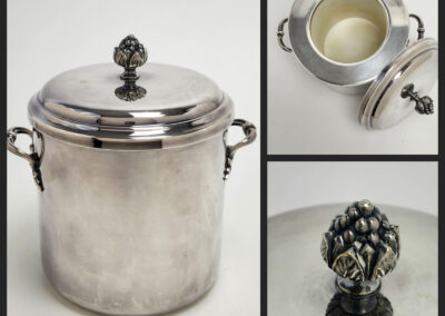 Silver ice bucket with decorative lid knob