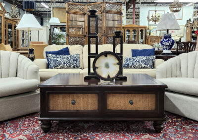 Furniture showroom seating with dark wood coffee table
