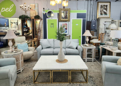 Furniture showroom with gray sofa and lamps