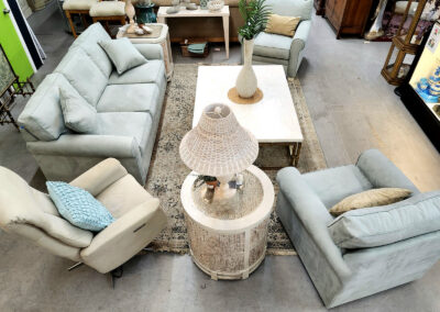 Gray sofas and chairs around coffee table