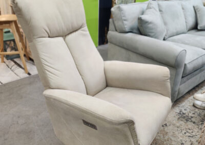 Beige recliner chair in furniture showroom